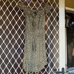 Green polka dot mini dress